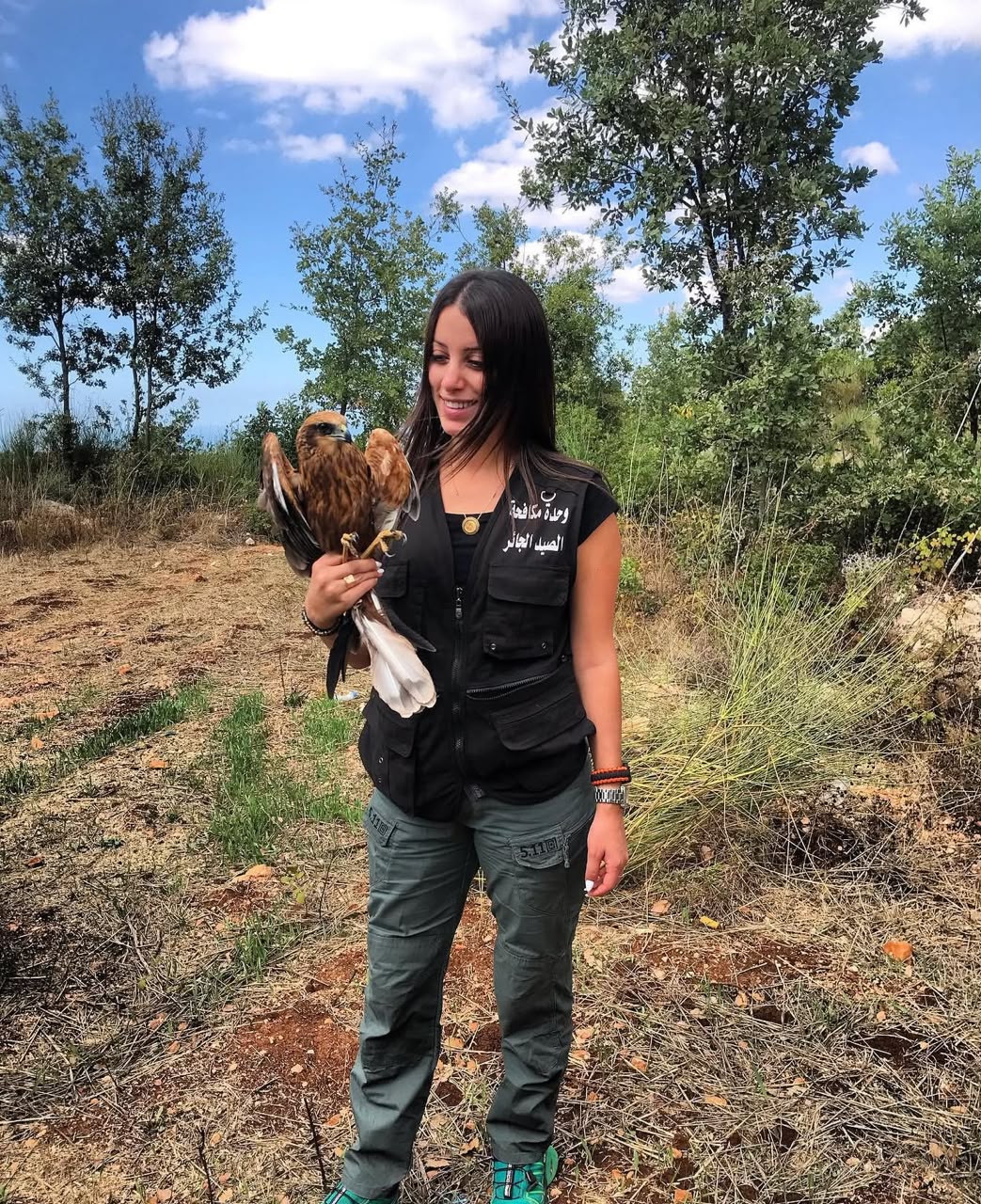 Shireen Bou Rafoul on a field mission to rescue a bird of prey.